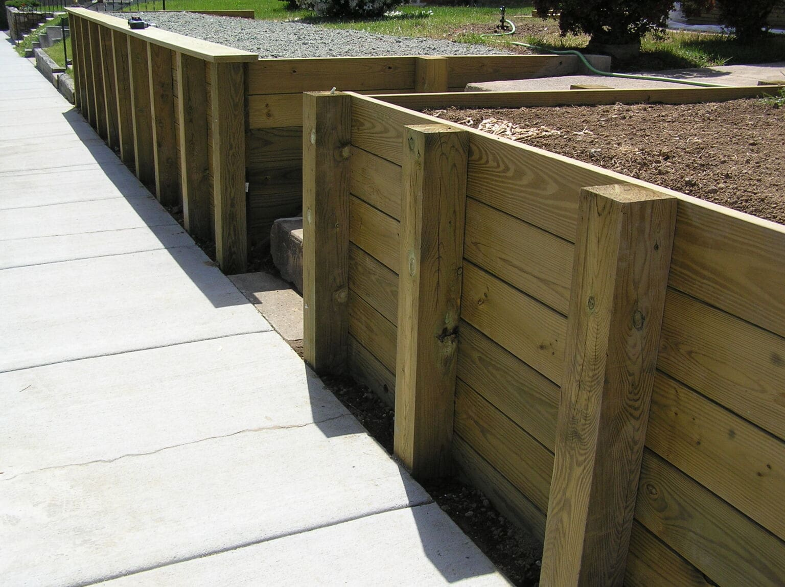 Timber retaining wall built by Walker Property Maintenance